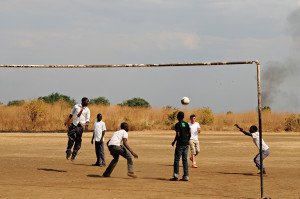 The boys playing football (soccer)